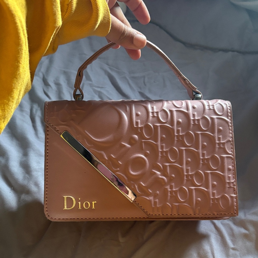 Dior Embossed Mauve Clutch with Gold Accent